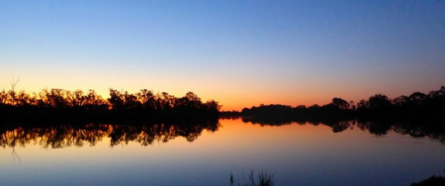 Sunset reflections on river Murray at dusk
