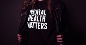 Woman with Mental Health Matters tshirt